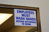 employees wash hands